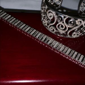 Two sterling silver bracelets with genuine dia.